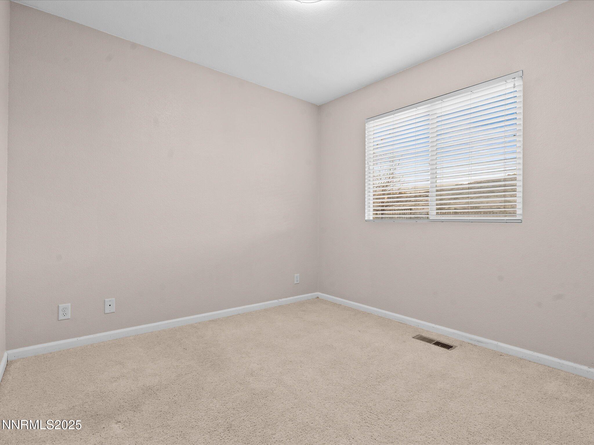 7260 Winterhill Court Reno, NV 89523 - Photo 19 of 39 an empty room with a window