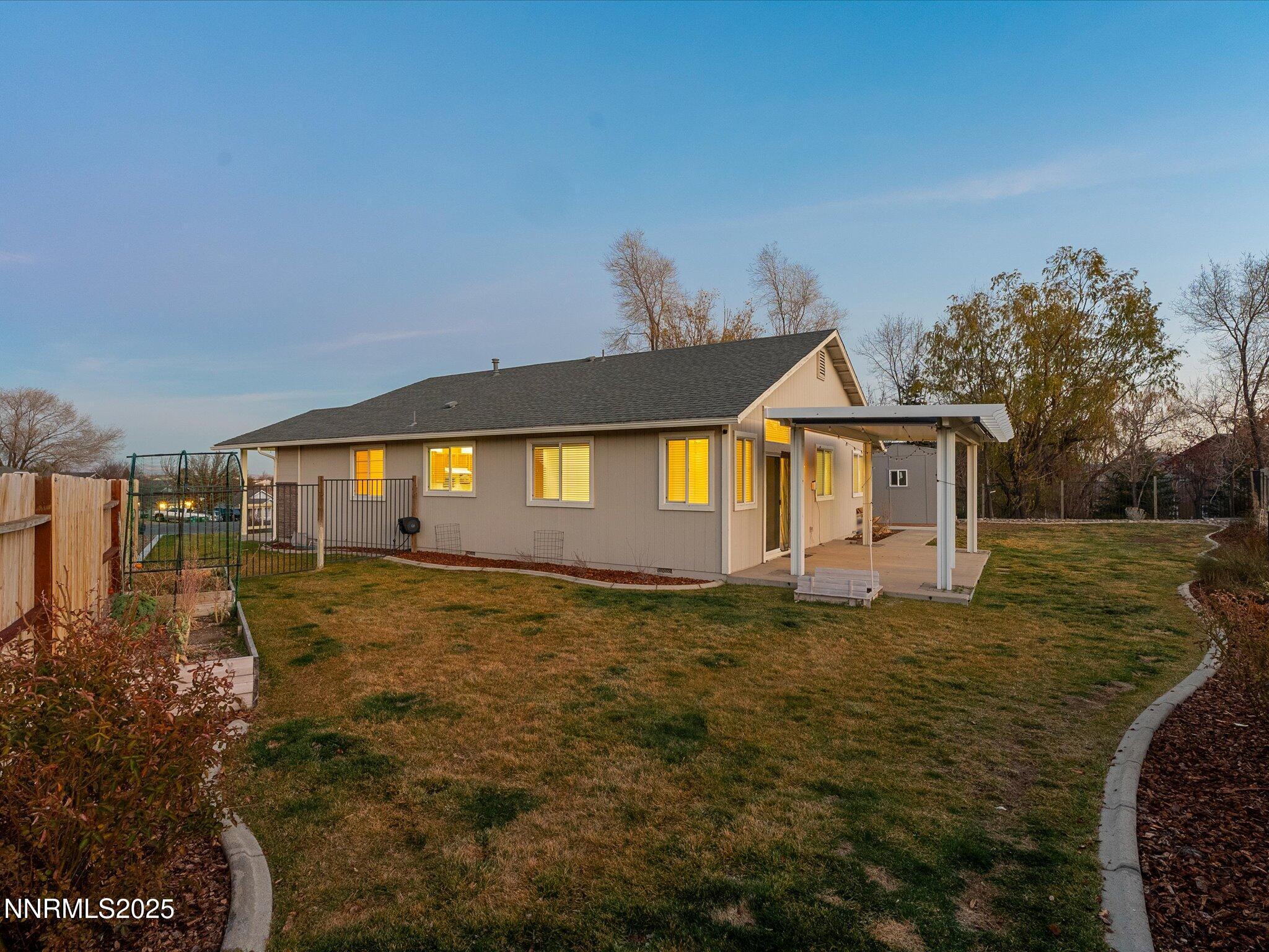 7260 Winterhill Court Reno, NV 89523 - Photo 38 of 39 a front view of a house with a yard