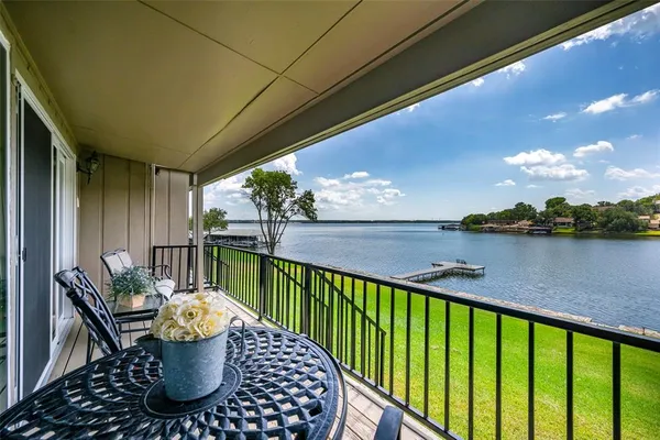 a view of balcony with furniture