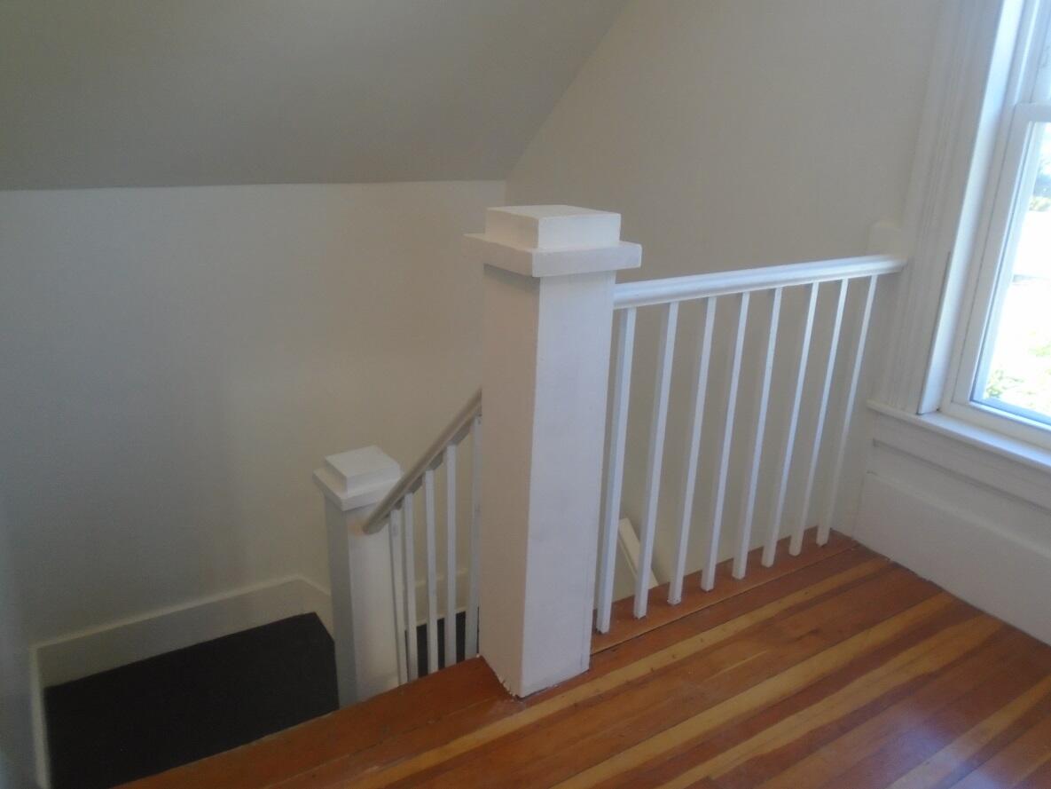 23 Fowler Street Augusta, ME 04330 - Photo 13 of 25 13 Top of stairway with sunny window