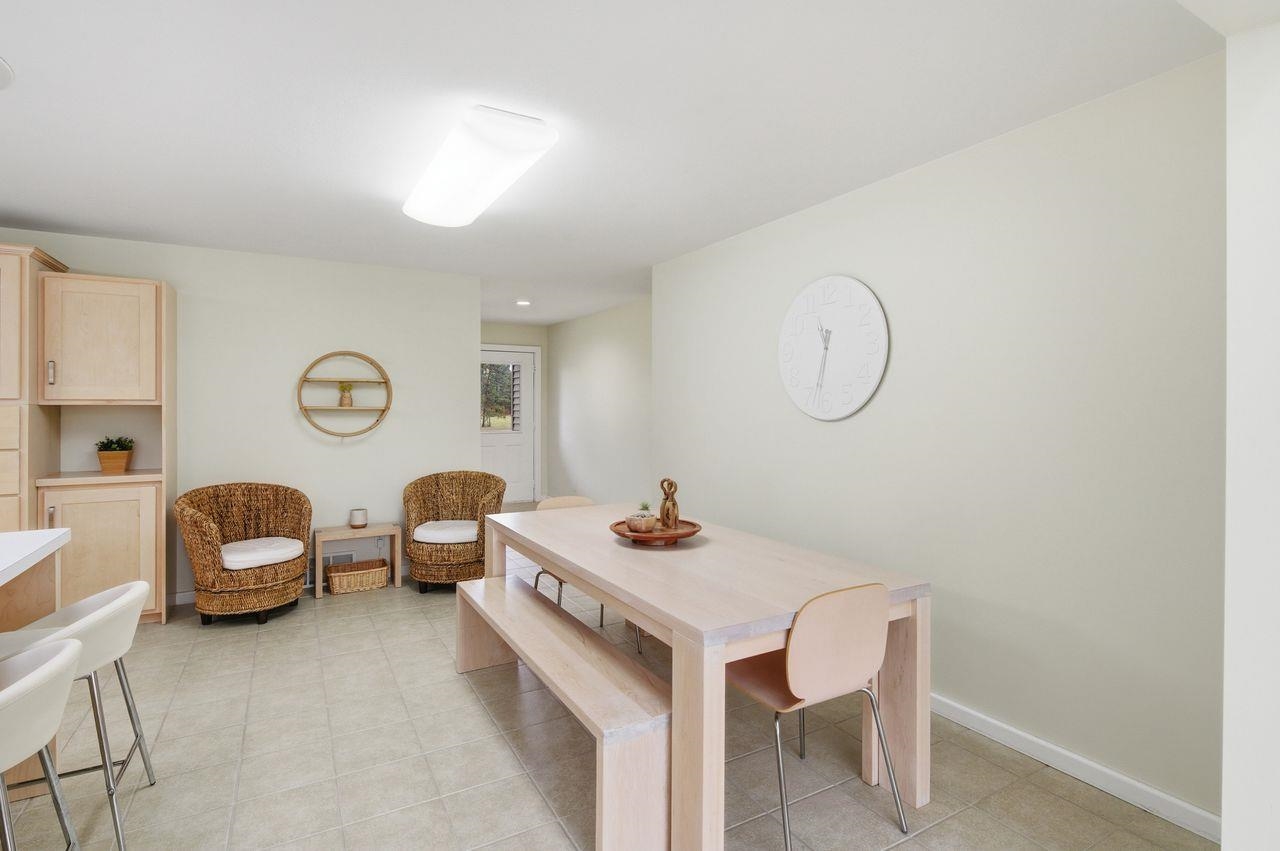 64903 Charles Johnson Road Ashland, WI 54806 - Photo 13 of 52 Dining space featuring baseboards and light tile patterned flooring