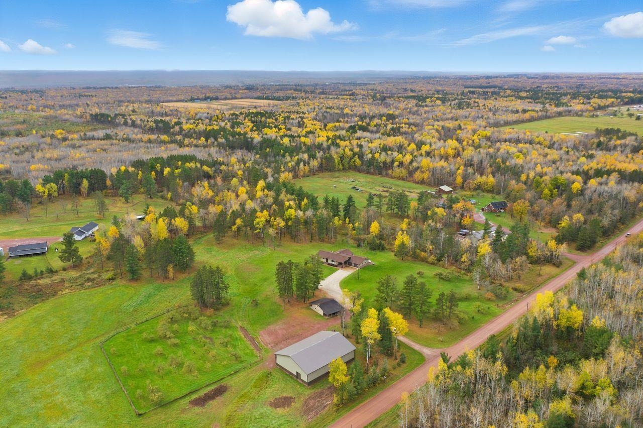 64903 Charles Johnson Road Ashland, WI 54806 - Photo 4 of 52 View of property location with a heavily wooded area