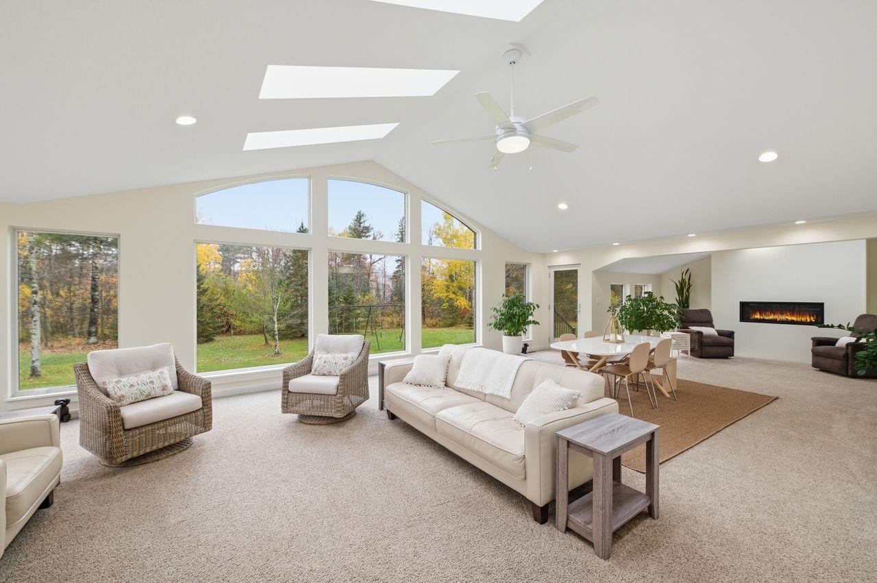 64903 Charles Johnson Road Ashland, WI 54806 - Photo 6 of 52 Sunroom with vaulted ceiling and a skylight
