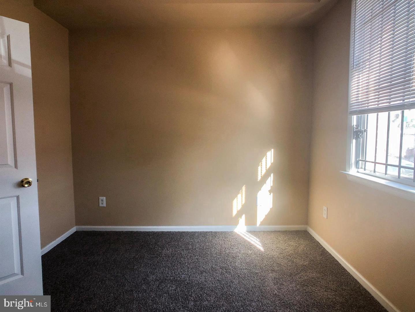 1507 West Susquehanna Avenue Philadelphia, PA 19132 - Photo 2 of 10 a view of an empty room and window