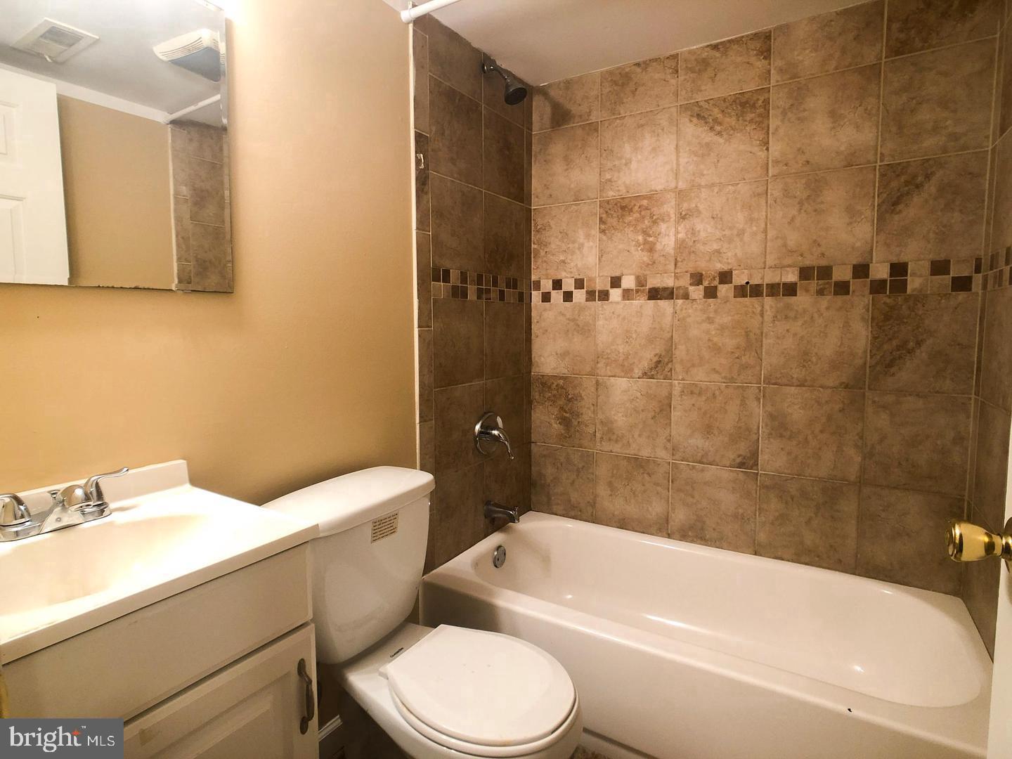 1507 West Susquehanna Avenue Philadelphia, PA 19132 - Photo 4 of 10 a bathroom with a toilet sink and shower