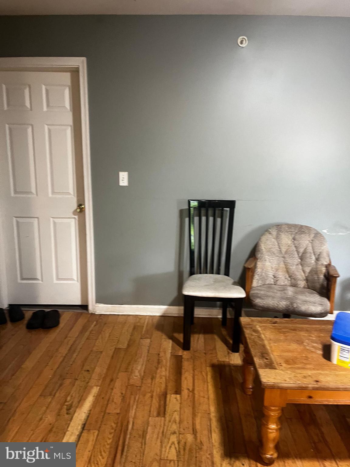 1507 West Susquehanna Avenue Philadelphia, PA 19132 - Photo 5 of 10 a view of a bedroom with furniture and wooden floor