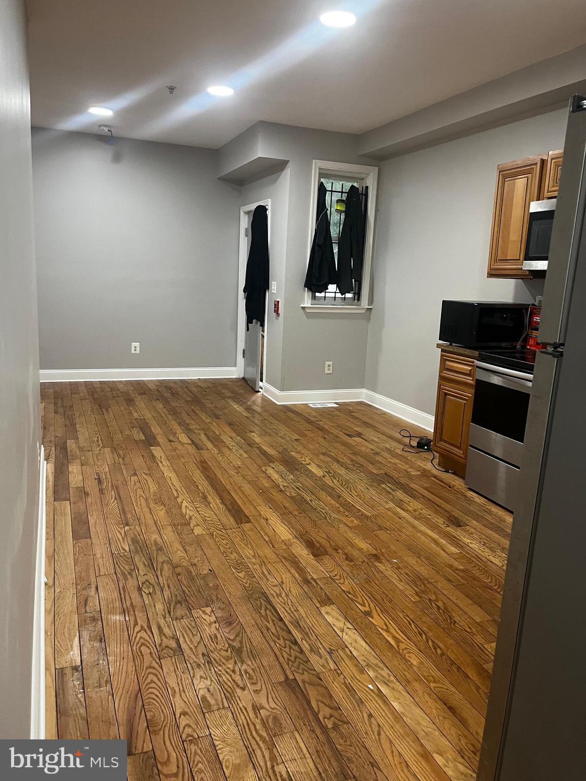 1507 West Susquehanna Avenue Philadelphia, PA 19132 - Photo 8 of 10 a view of a livingroom with wooden floor