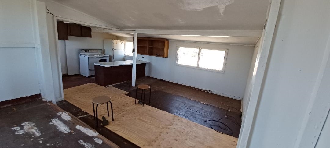 2676 Kalanikahua Road Haiku, HI 96708 - Photo 14 of 18 a bedroom with furniture and a window