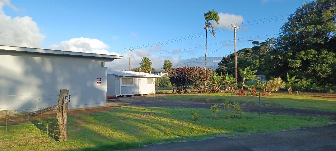 2676 Kalanikahua Road Haiku, HI 96708 - Photo 5 of 18 a view of a porch with a table and chairs