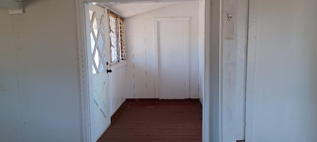 2676 Kalanikahua Road Haiku, HI 96708 - Photo 10 of 18 a view of a room with wooden floor