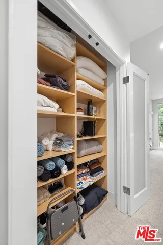 a room with storage and utility room