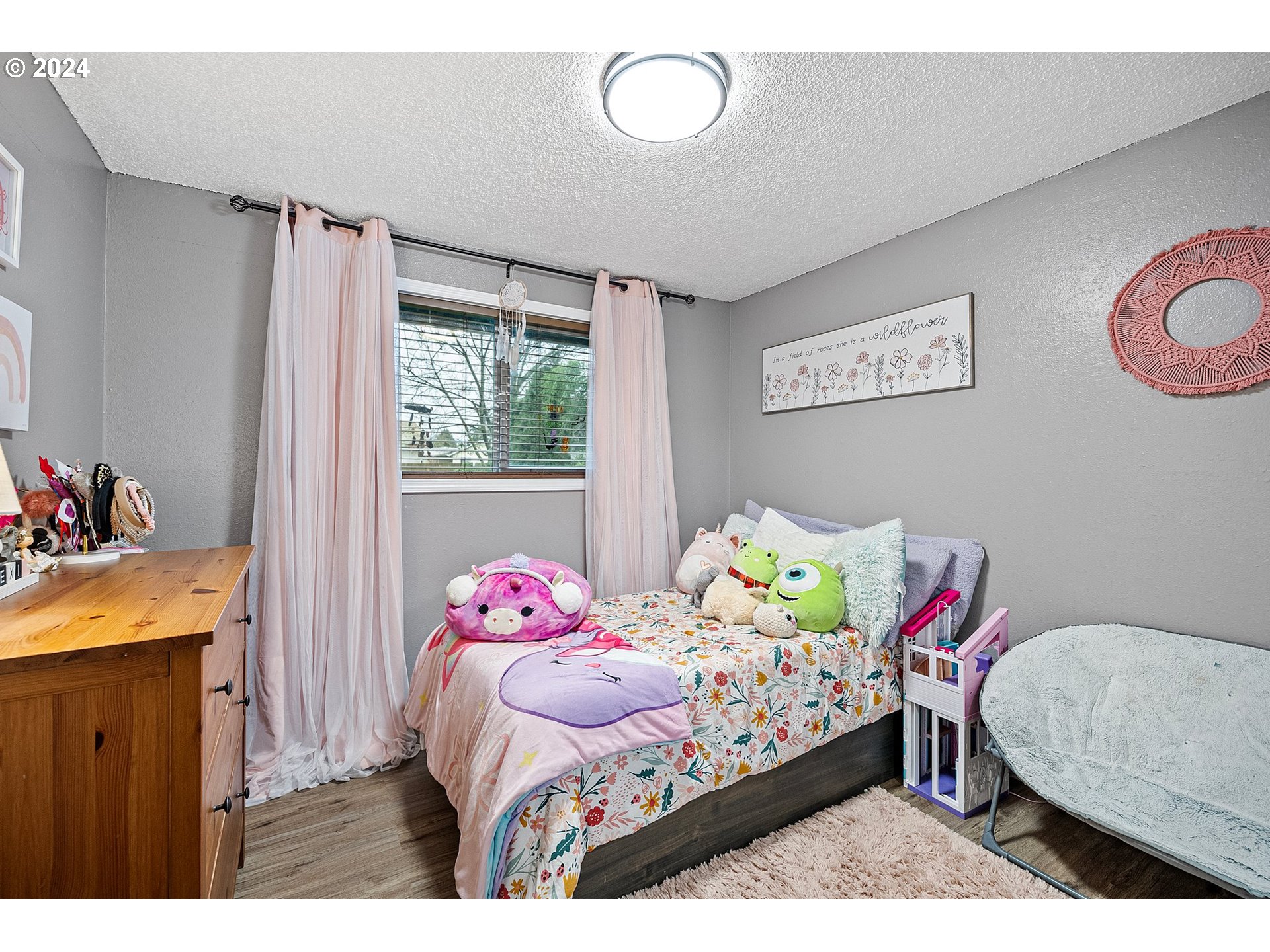 525 South 35th Street Springfield, OR 97478 - Photo 24 of 40 a bedroom with a bed and window