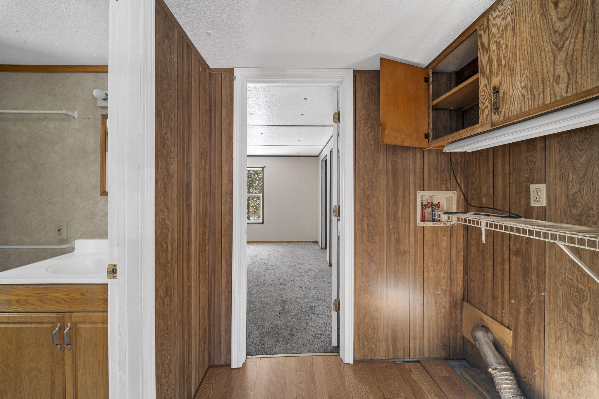 267 East Newport Road Stetson, ME 04488 - Photo 14 of 27 primary bedroom, bath + laundry area