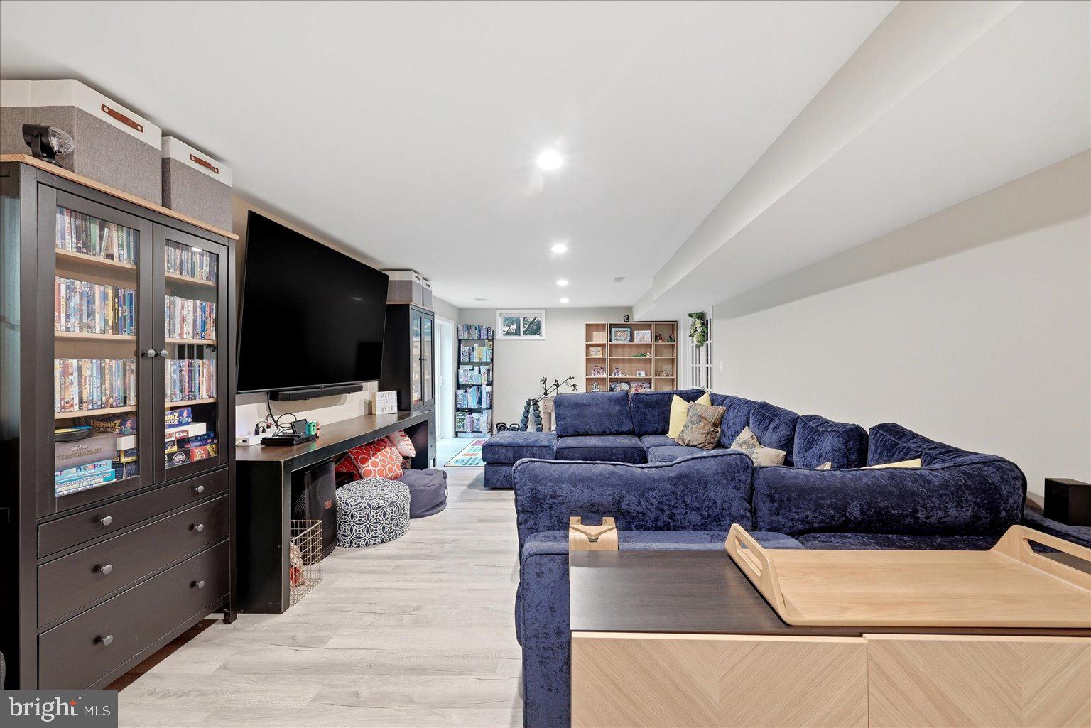 911 Riva Ridge Drive Great Falls, VA 22066 - Photo 32 of 55 Spacious, modern entertainment haven.