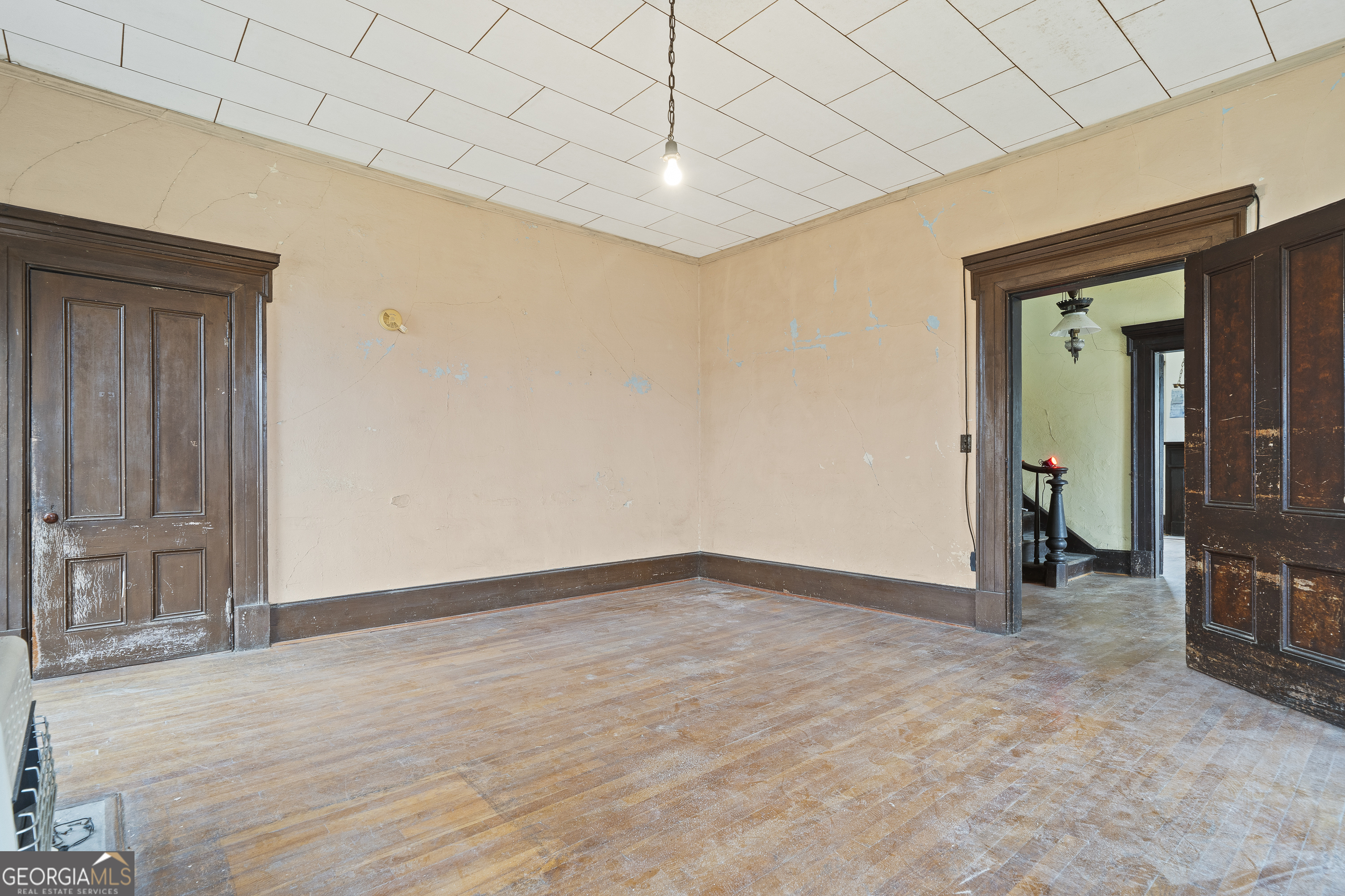 12871 Linton Road Sparta, GA 31087 - Photo 39 of 52 a view of empty room with wooden floor