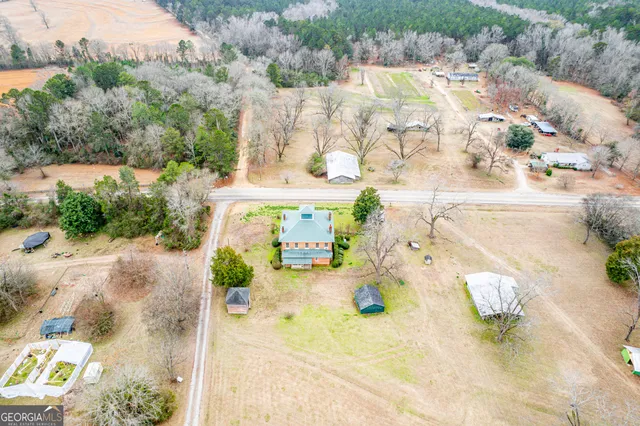 a view of yard along with trees