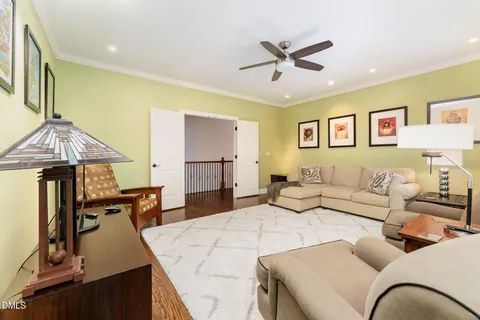 a spacious bathroom with a granite countertop sink mirror and a bathtub