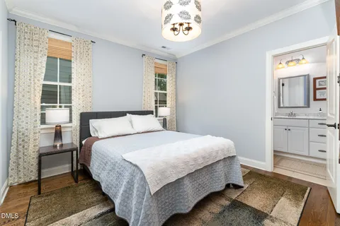 a bedroom with a bed and a closet