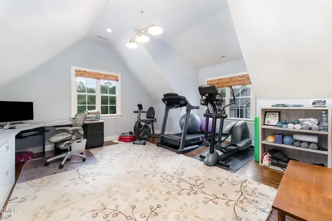 a bedroom with a bed and a cabinets