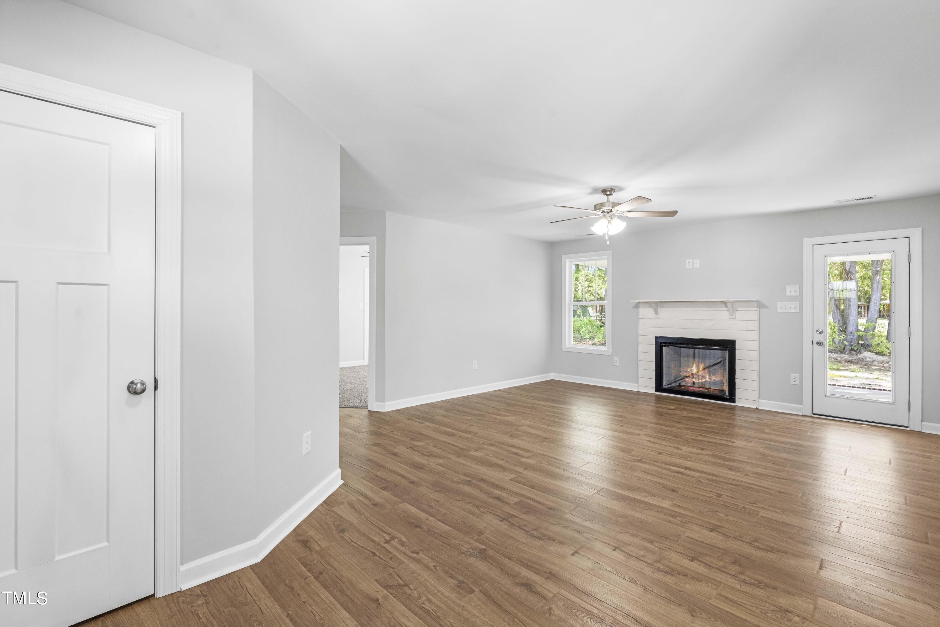291 Wiggs Road Selma, NC 27576 - Photo 3 of 21 Living Room with Gas Log FP