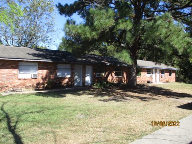 764 Terminal Street, Unit 3 & 4 Columbus, GA 31906 - Photo 1 of 7 a view of a house with a yard