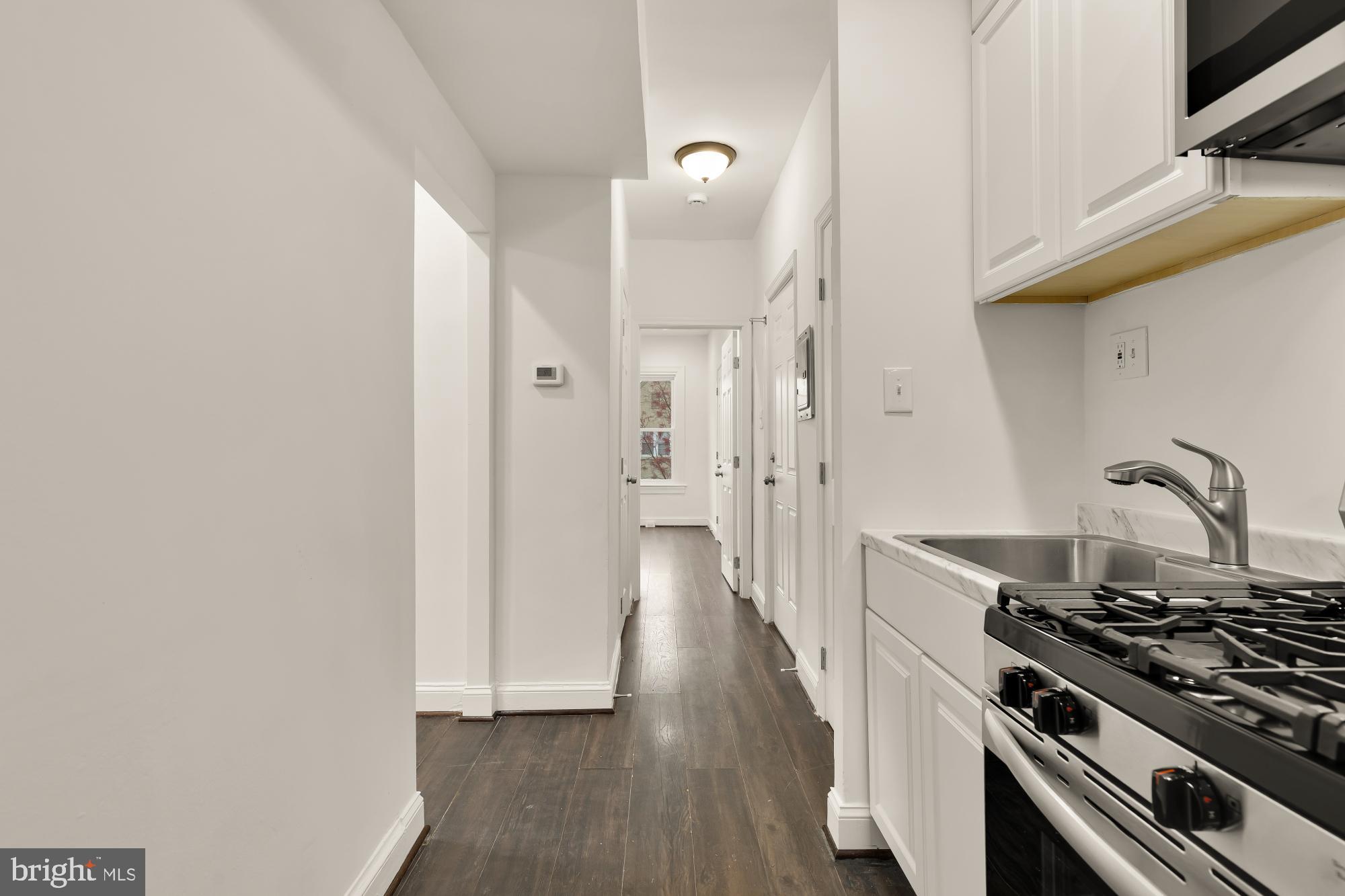 1113 Penn Street Northeast, Unit 4 Washington, DC 20002 - Photo 12 of 22 Modern kitchen with sleek finishes.