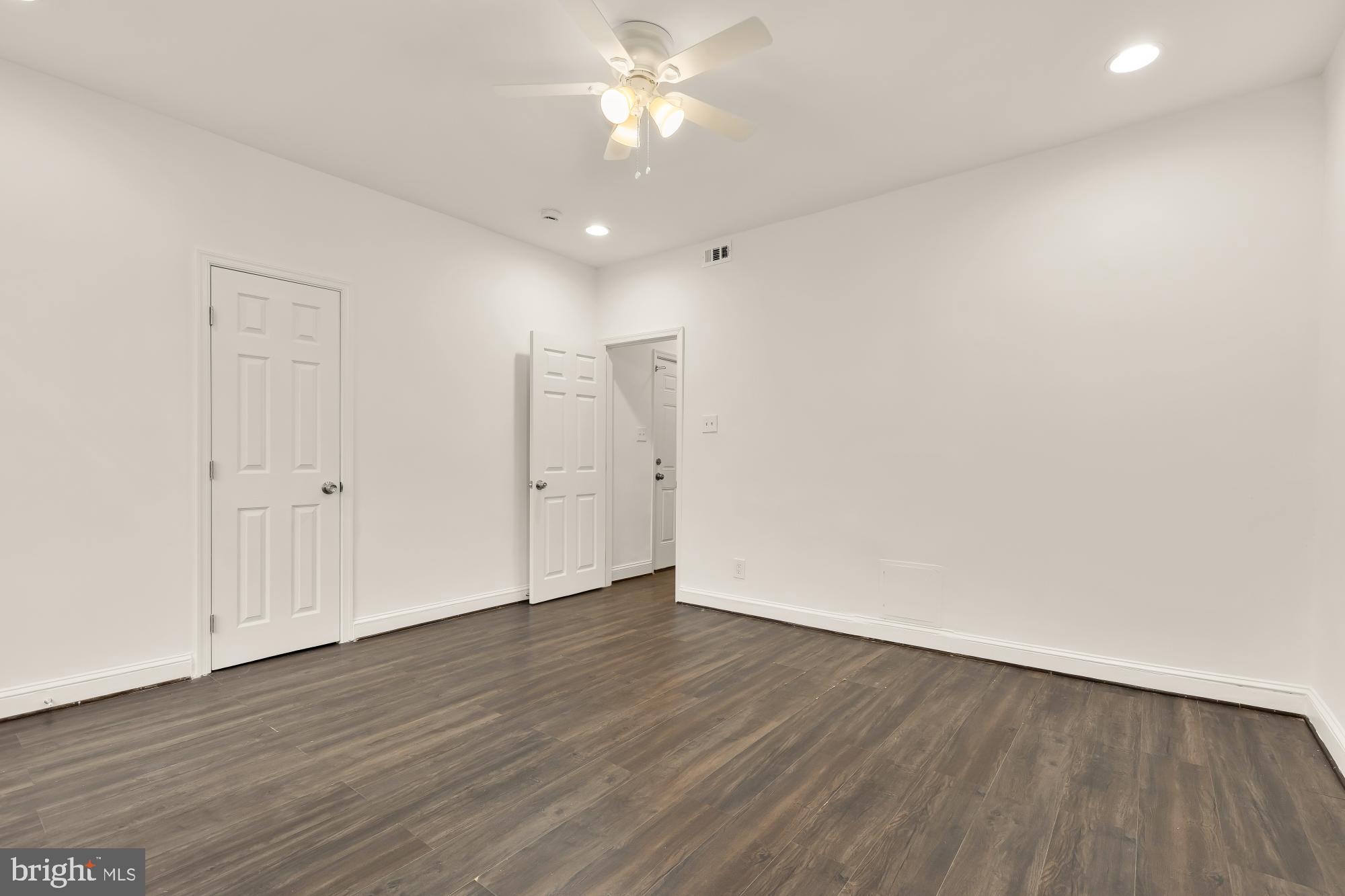 1113 Penn Street Northeast, Unit 4 Washington, DC 20002 - Photo 5 of 22 Spacious, bright room with modern finishes.