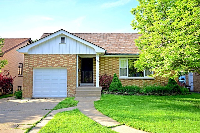 439 Shenstone Road Riverside, IL 60546 - Photo 1 of 25 a front view of a house with a yard