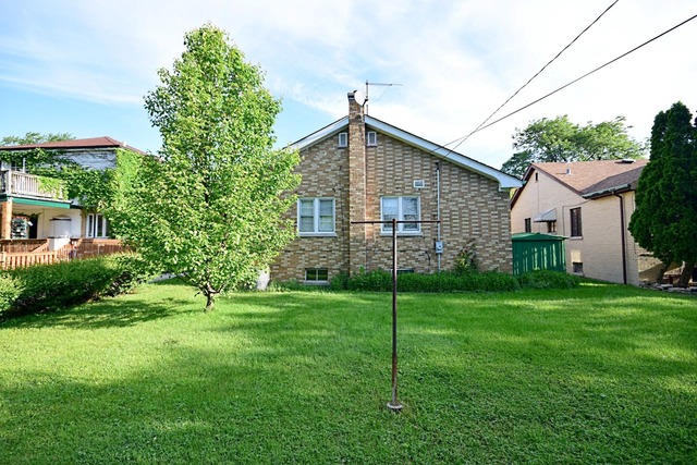 439 Shenstone Road Riverside, IL 60546 - Photo 23 of 25 a view of a house with a yard