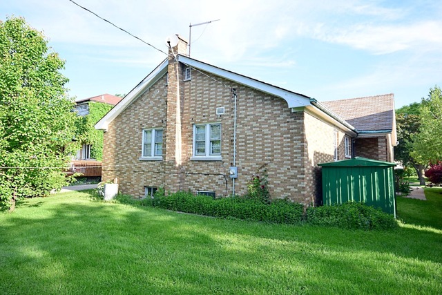 439 Shenstone Road Riverside, IL 60546 - Photo 24 of 25 a view of a house with a yard