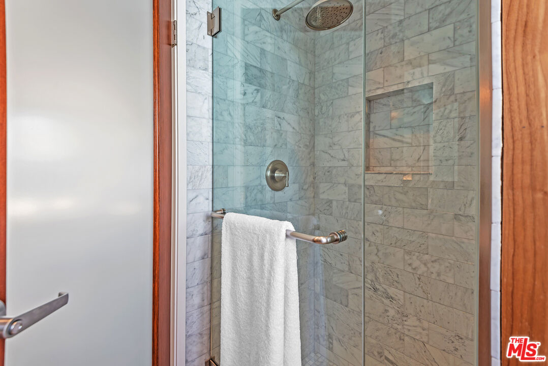 851 North Kings Road, Unit 307 West Hollywood, CA 90069 - Photo 30 of 38 a bathroom with a shower