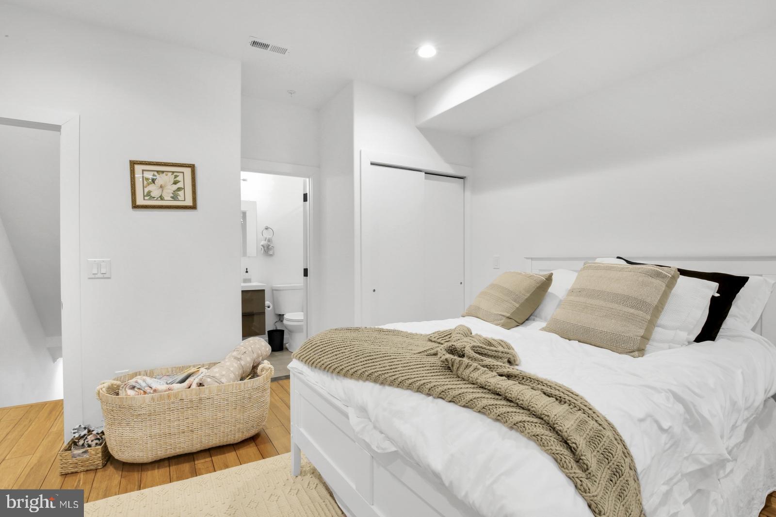 2604 Reed Street Philadelphia, PA 19146 - Photo 15 of 32 a bedroom with a bed and couch