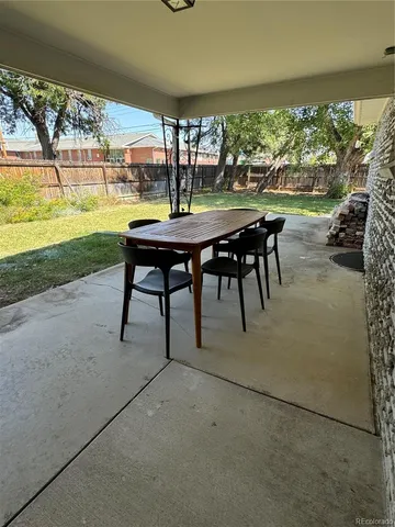 a bedroom with bed and window