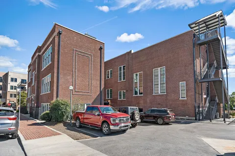 a view of a chairs and tables in the patio