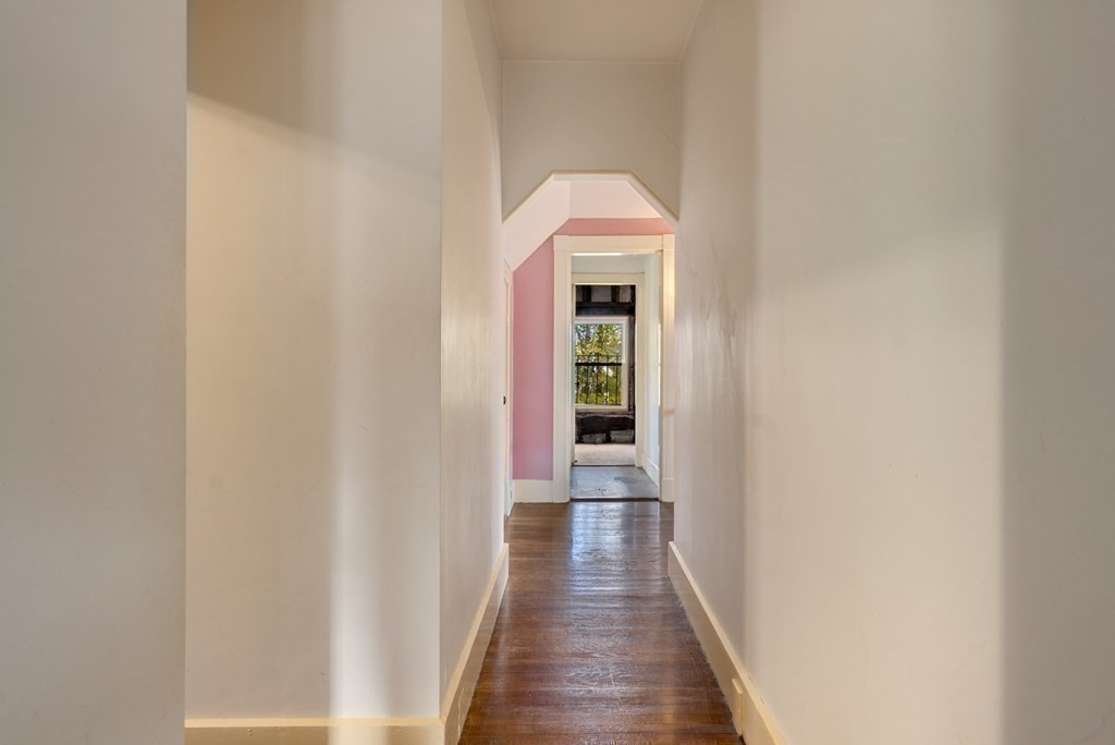 11 Gorham Avenue Brookline, MA 02445 - Photo 15 of 32 a view of a hallway with wooden floor