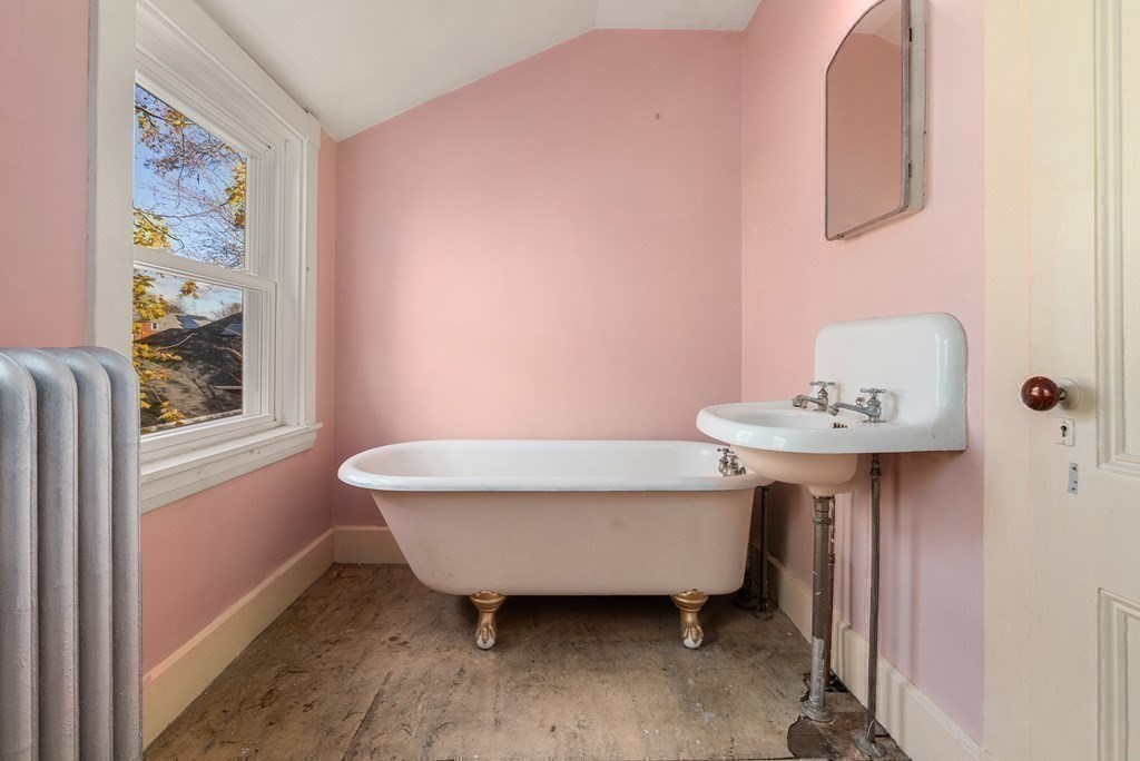 11 Gorham Avenue Brookline, MA 02445 - Photo 24 of 32 a bathroom with a sink and a mirror