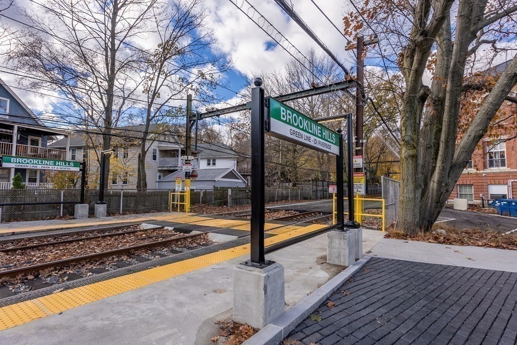 11 Gorham Avenue Brookline, MA 02445 - Photo 28 of 32 a view of a street with wooden fence