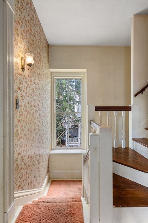 11 Gorham Avenue Brookline, MA 02445 - Photo 5 of 32 a living room with furniture and a window