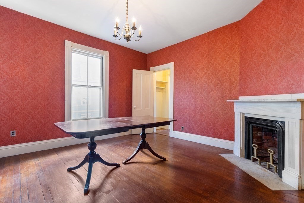 11 Gorham Avenue Brookline, MA 02445 - Photo 10 of 32 a view of a livingroom with furniture and a fireplace