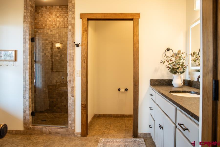 66961 Solar Road Montrose, CO 81403 - Photo 25 of 44 a view of bathroom with shower