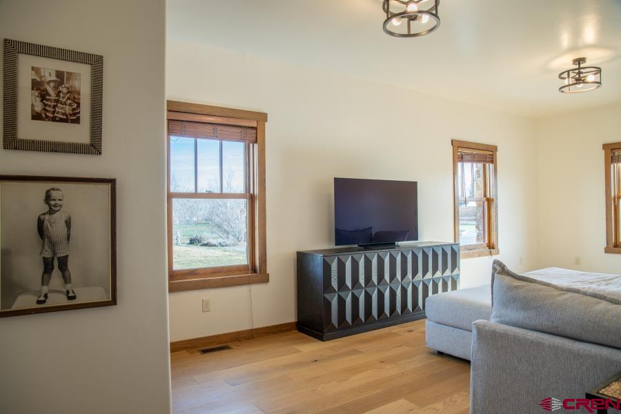 66961 Solar Road Montrose, CO 81403 - Photo 37 of 44 a living room with furniture and a window
