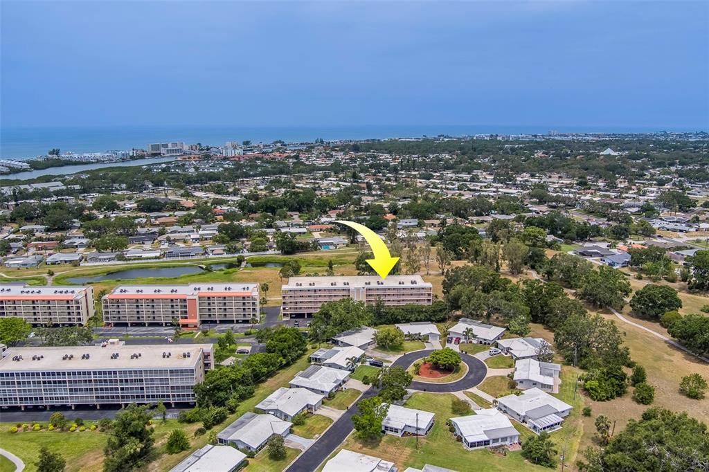 a view of a city with an ocean view