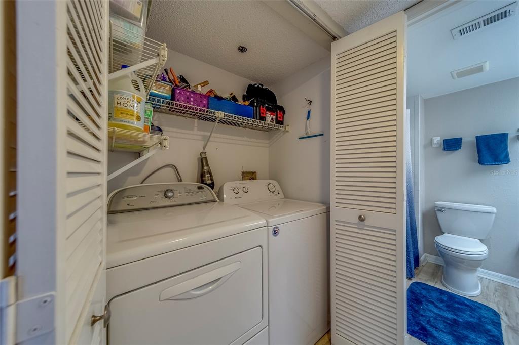 9510 Harbor Greens Way, Unit 407 Seminole, FL 33776 - Photo 25 of 41 a view of storage and utility room