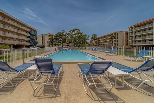 a view of a chairs and table on the terrace