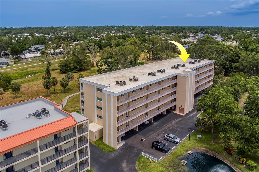 9510 Harbor Greens Way, Unit 407 Seminole, FL 33776 - Photo 33 of 41 a view of a balcony with an ocean