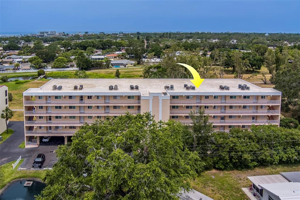 9510 Harbor Greens Way, Unit 407 Seminole, FL 33776 - Photo 34 of 41 a view of a city with tall buildings