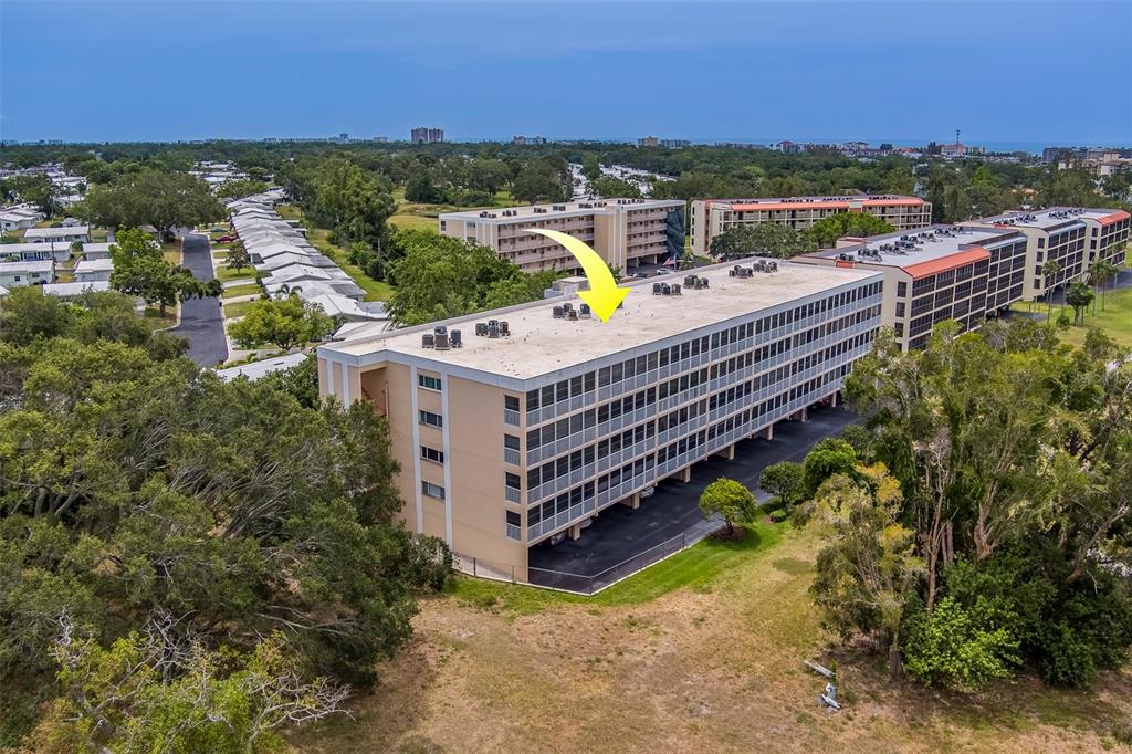 9510 Harbor Greens Way, Unit 407 Seminole, FL 33776 - Photo 37 of 41 a view of a balcony with lake view and mountain view