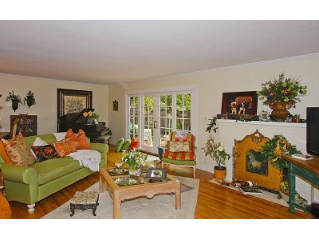 1635 Springer Road Mountain View, CA 94040 - Photo 2 of 8 a living room with furniture and a flat screen tv
