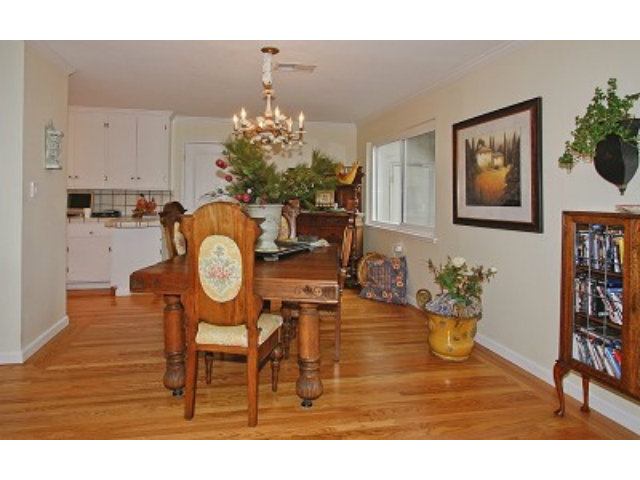 1635 Springer Road Mountain View, CA 94040 - Photo 6 of 8 a living room with furniture and a chandelier