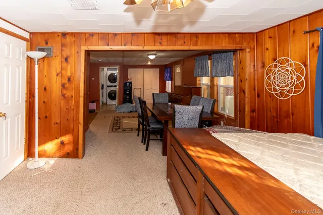 a view of a patio with table and chairs